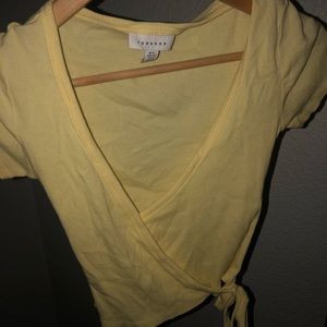yellow wrapped crop top